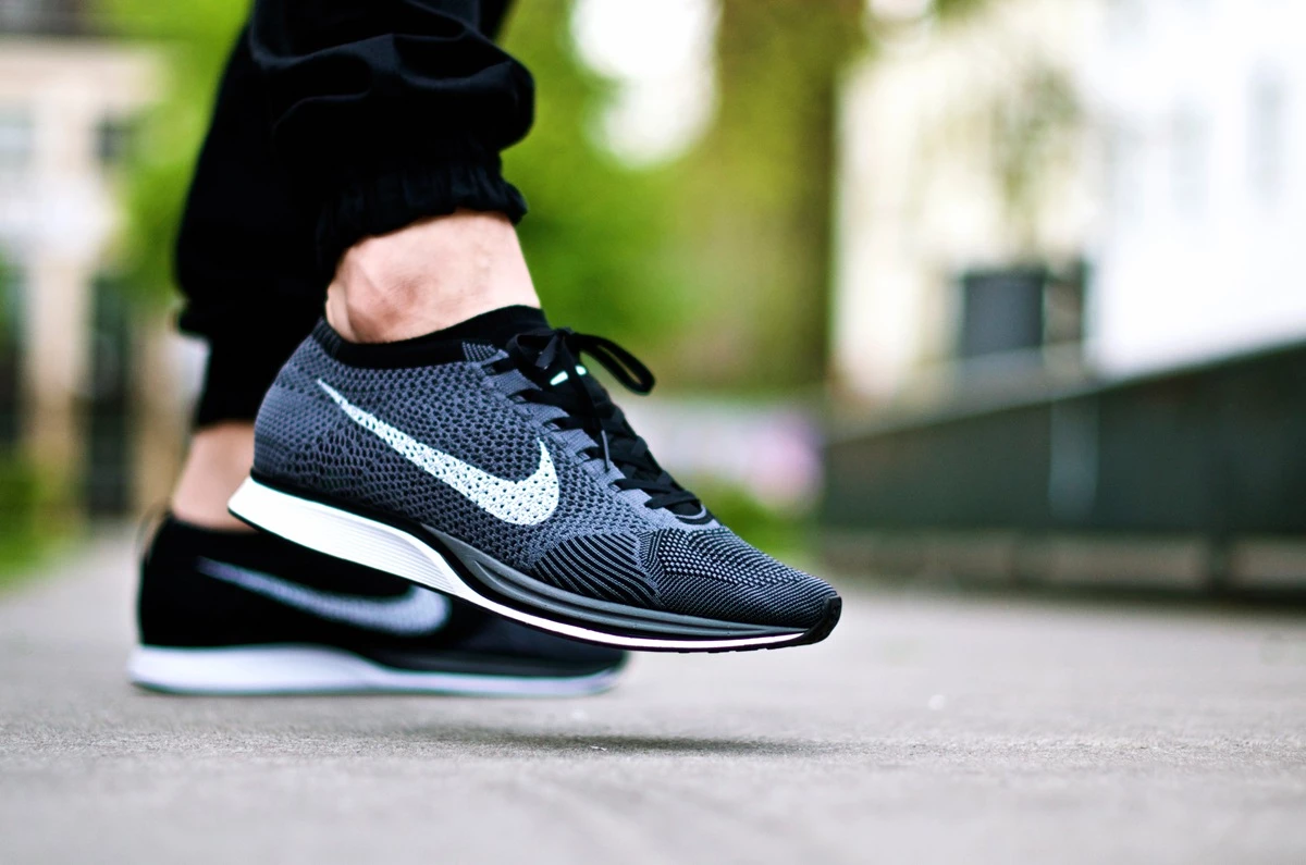 Nike flyknit racer dark grey/black/blue glow/pink foil hotsell