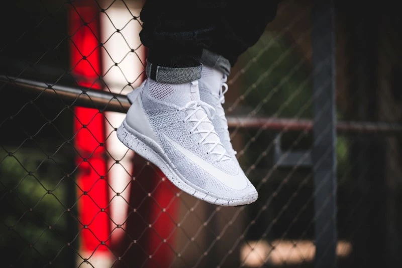 Nike Free Flyknit Mercurial All White on feet via Solebox Dead Stock