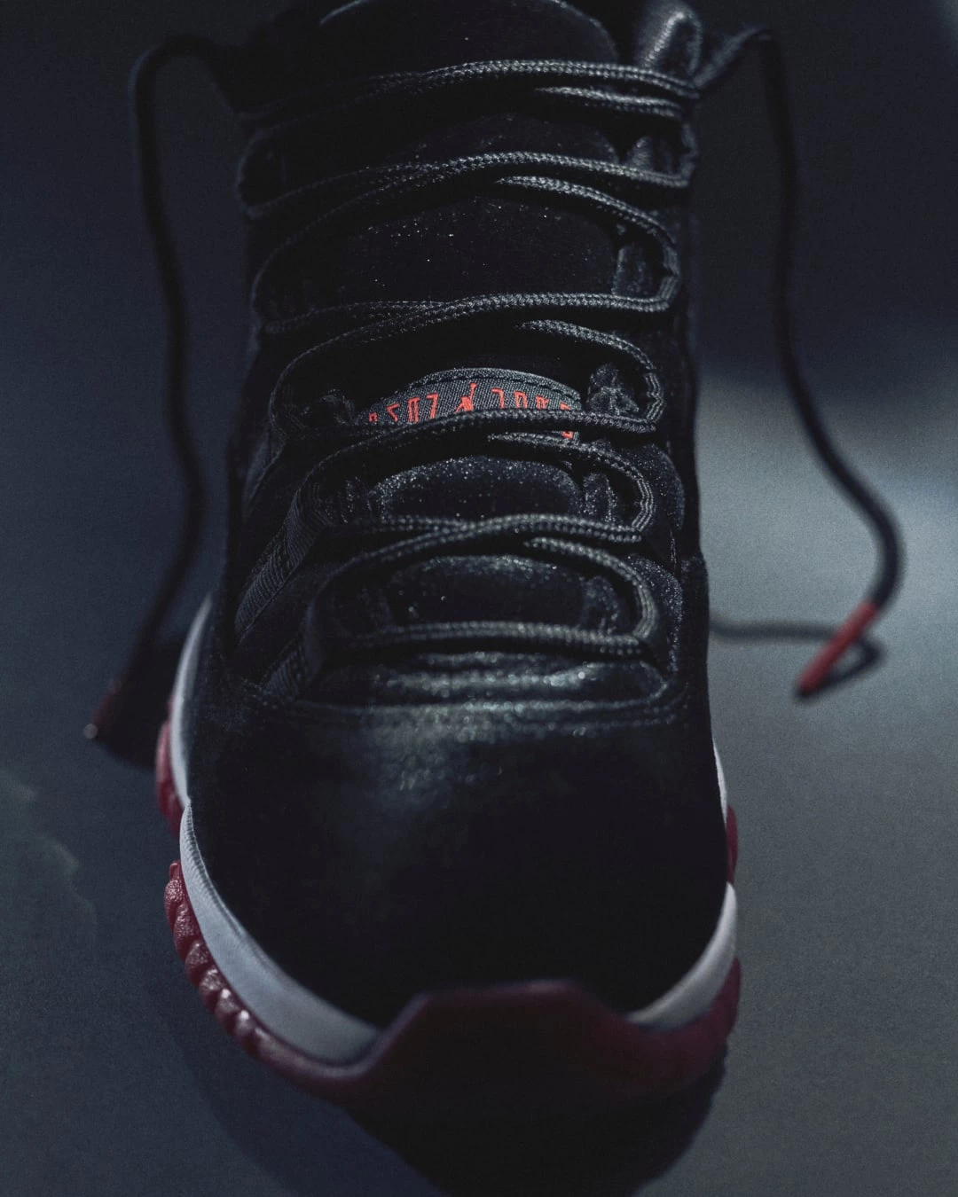 Jordan 11 bred mid best sale