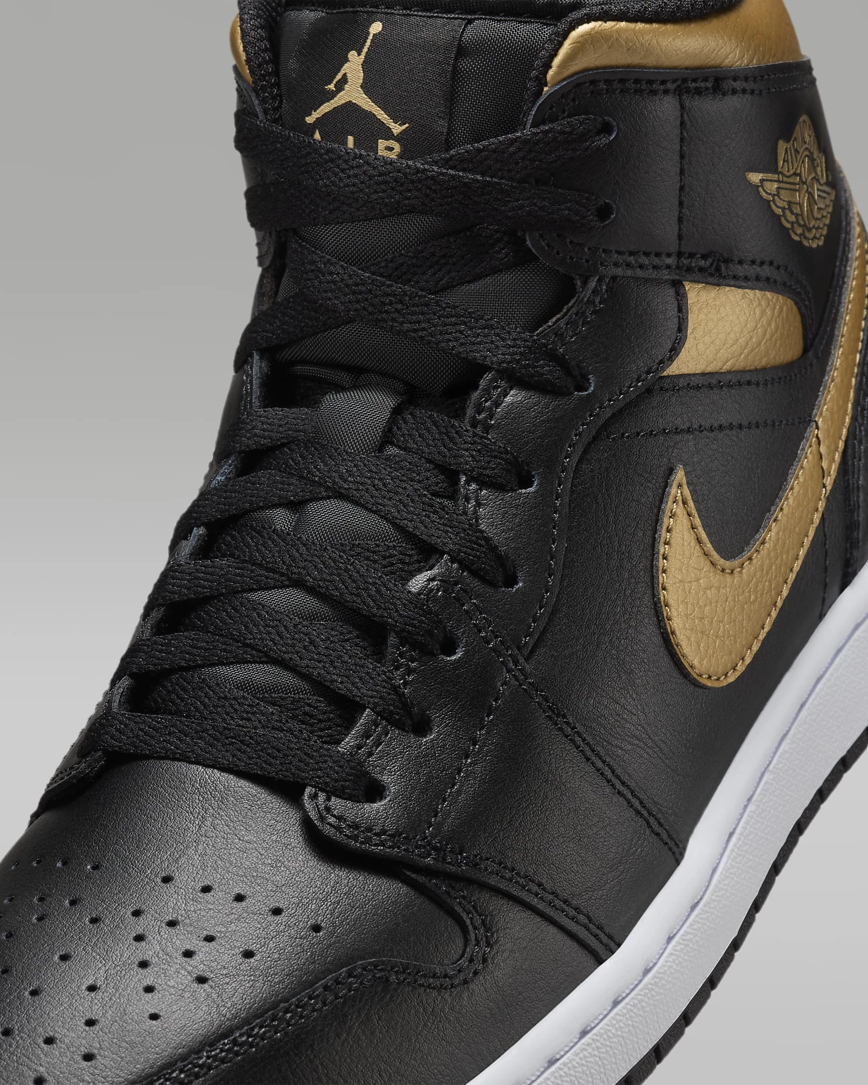 Jordan 1 Mid Black Gold Swoosh Dead Stock