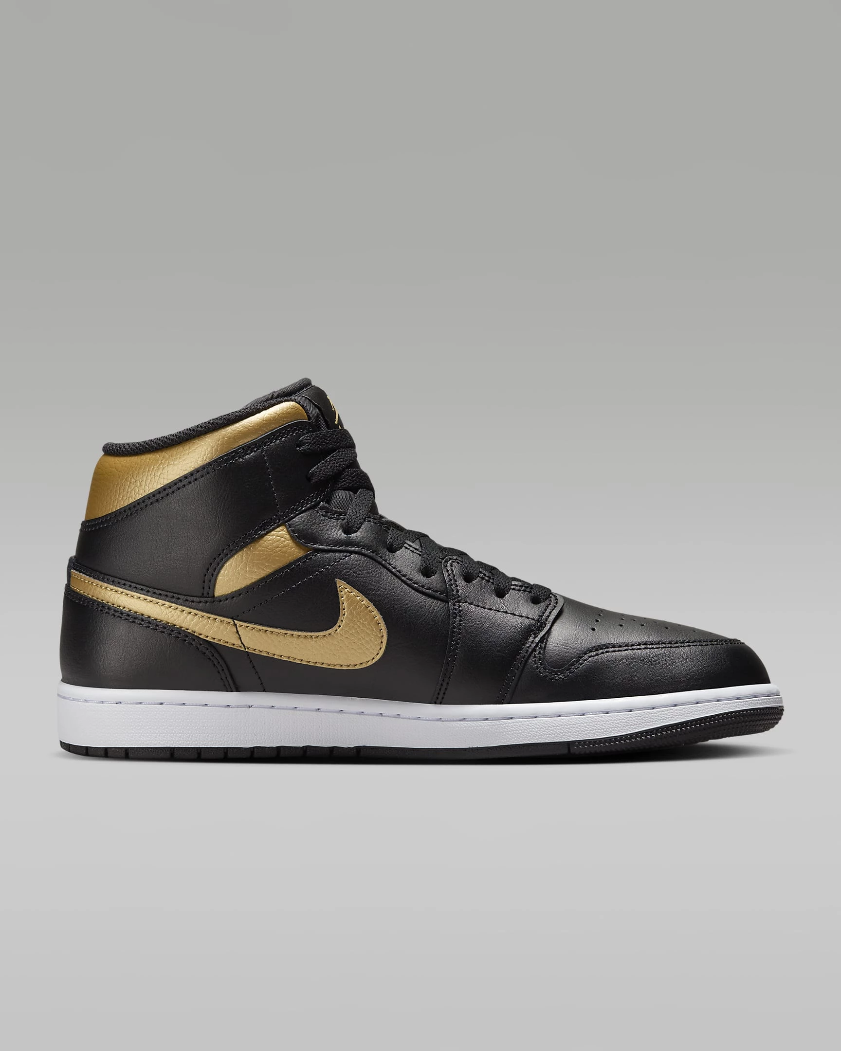 Jordan 1 Mid Black Gold Swoosh Dead Stock