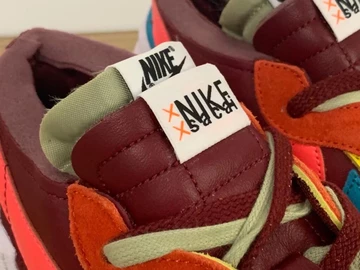 KAWS x Sacai x Nike Blazer Low Red