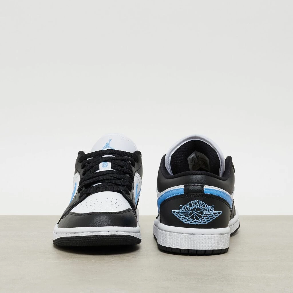 Black jordans with blue logo deals