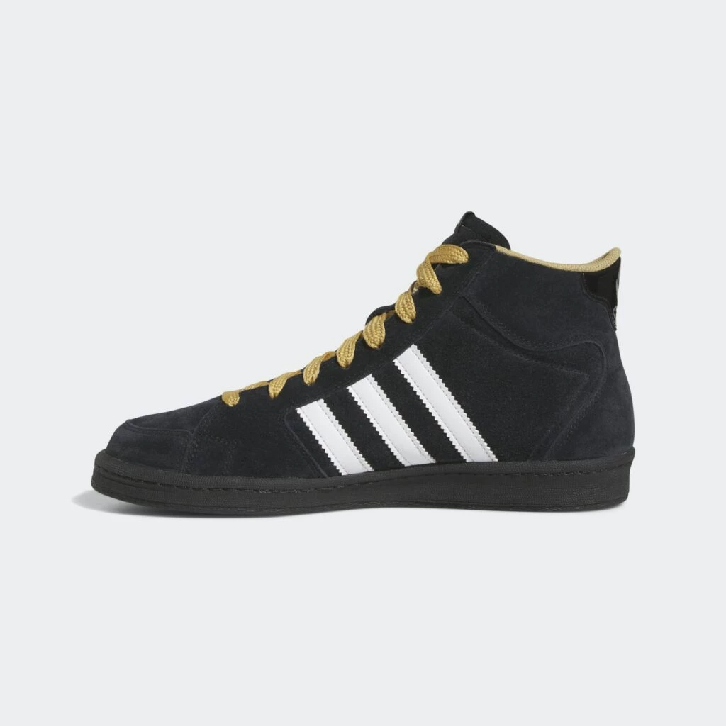 Black and yellow adidas high tops on sale