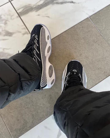 NOCTA Nike Glide Black White - on feet oben