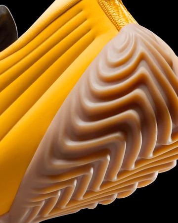Nike Astra Ultra University Gold Ferse Details