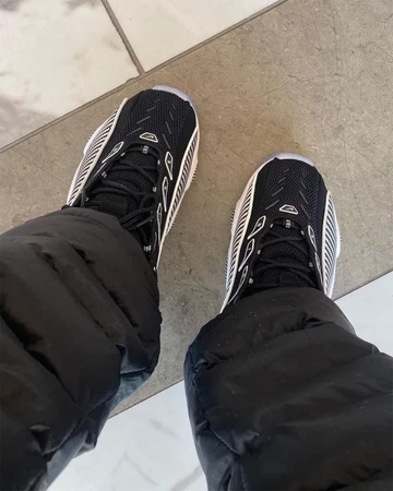 NOCTA Nike Glide Black White - on feet oben (2)