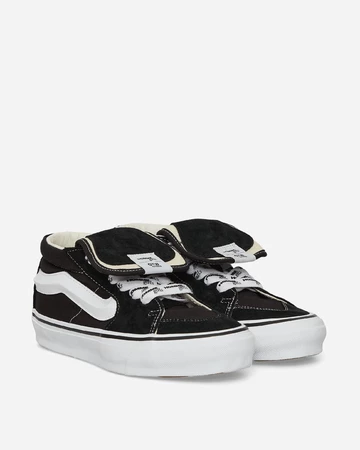 Homme Girls x Vans Sk8-Mid Reissue 83 Black Paar schräg seitlich