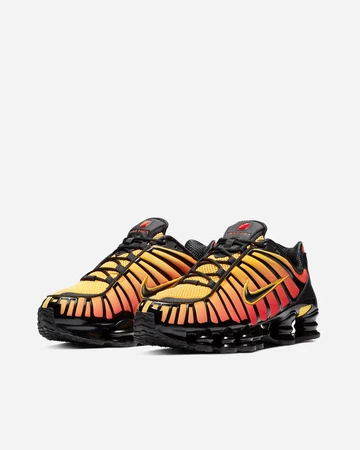 Nike Shox TL Amarillo Paar schräg seitlich