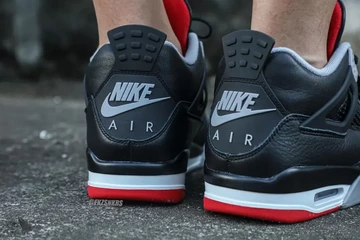 Jordan 4 Bred Reimagined on feet from the back with Nike Air
