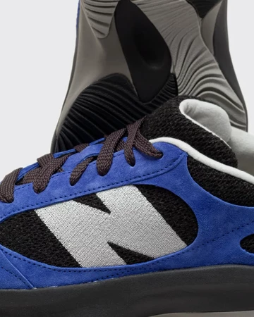 New Balance Warped Runner Marine Blue Detail Logo