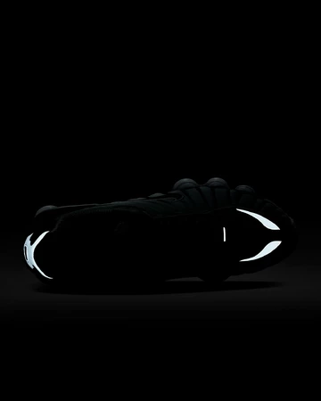 Nike Shox TL Metallic Platinum Upper in the dark