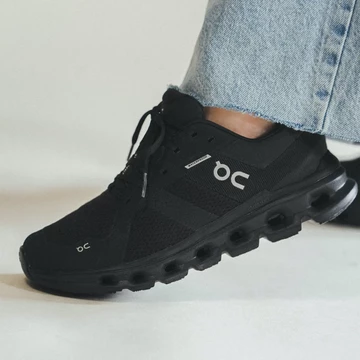 On Running Cloudrunner Waterproof Black On Feet Detail