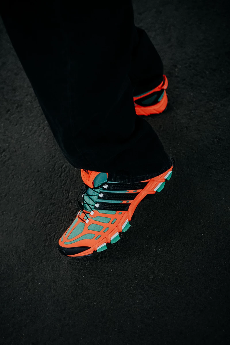 海外限定カラーレア商品 Adistar Raven Solar Orange Adidas Men's ADISTAR RAVEN OG Sneakers in Solar Orange/Core