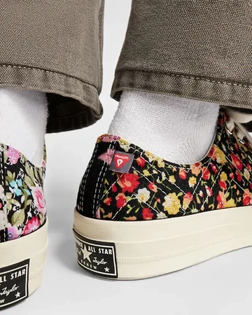 Beyond Retro Converse Chuck 70 Lo beide Schuhe ferse