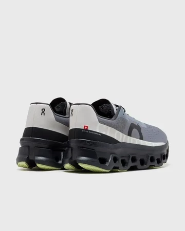 On Running Cloudmonster Fossil Magnet schräg von hinten