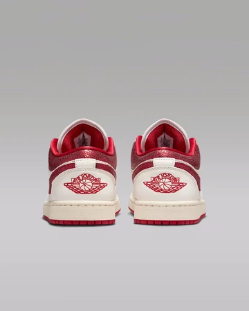 Jordan 1 Low White Ruby Paar Fersen