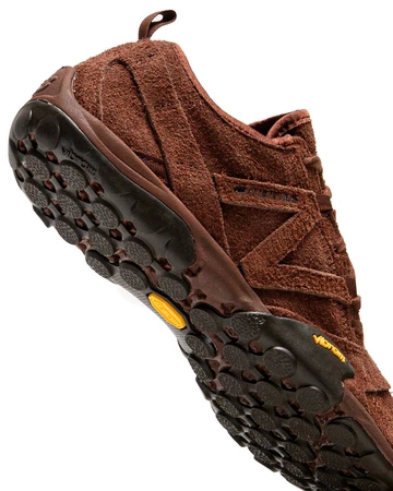 New Balance MT100 Rich Oak Sohle