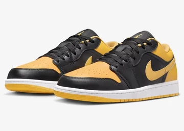 Jordan 1 Low Yellow Ochre schräg von außen