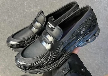 Junya Watanabe x New Balance 1906L schwarz schräg