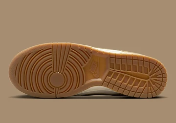 Nike Dunk Low Since 72 auf braunem Hintergrund Sohle