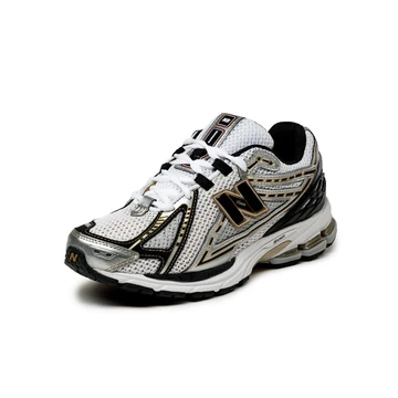 New Balance 1906R Metallic Gold - Seitlich