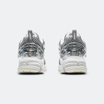 The Basement x New Balance 1906R Silver Pack Paar Ferse