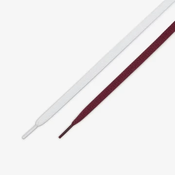 Zum Jordan 1 High 85 Metallic Burgundy gibt es weiße und rote Schnürsenkel